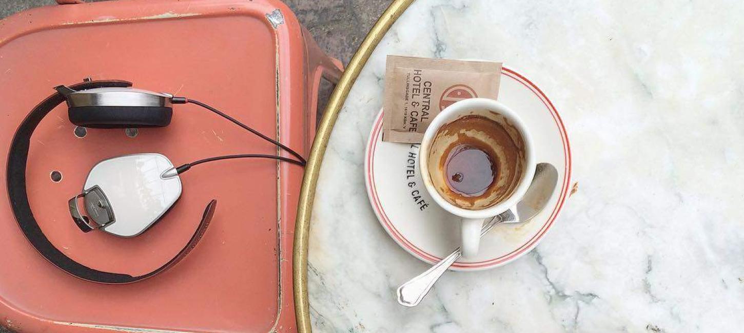 Headphones and coffee on a cafe in Copenhagen