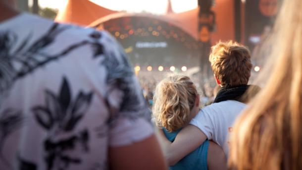 Couple in front of Orange Stage at Roskilde Festival