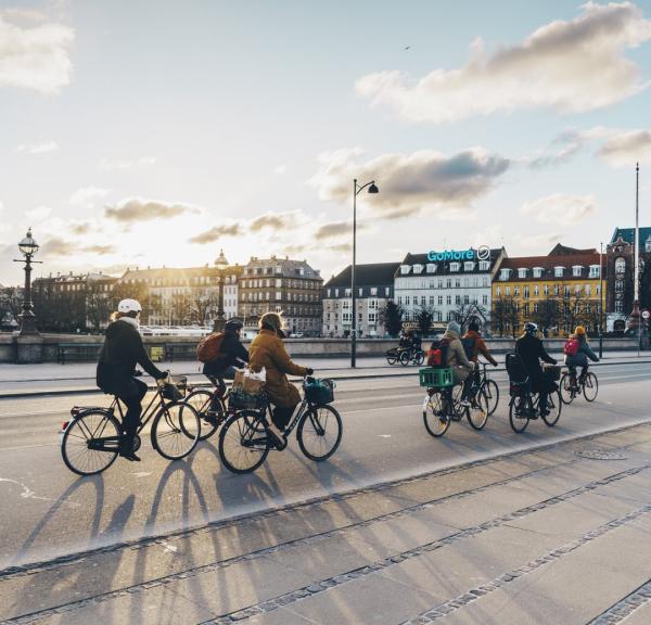 People cycling on Queen Louise's Bridge in winter, Copenhagen