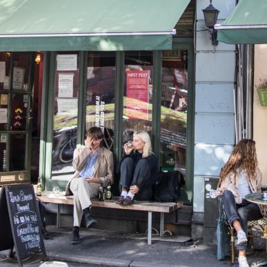 People sitting at café in Latin Quarter, Aarhus